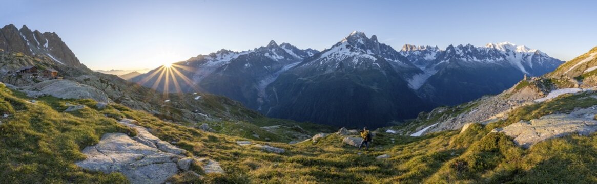 Panorama, morning atmosphere with sun star, Mountain landscape at sunrise, Mountain hut Refuge du Lac Blanc, Mountain peak, Aiguille Verte, Grandes Jorasses, Aiguille du Moine, Mont Blanc, Mont Blanc massif, Chamonix-Mont-Blanc, Haute-Savoie, France