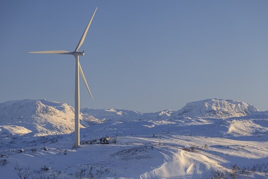 Wind turbine turning in the wind, winter, snow, sunny, Fjell, Bj&ouml;rnfjell, Norway