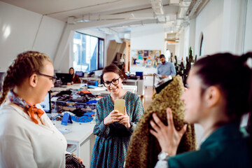 Young adults working in a textile office