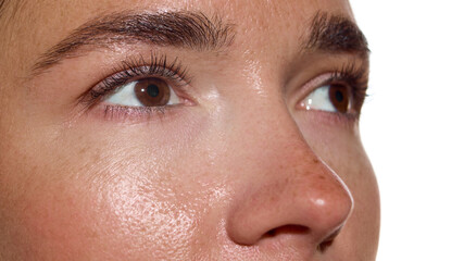 Female face macro with radiant skin and brows in bright light. Concept of wellness self care, natural lifestyle eco, social media influencer content, and mental health balance.