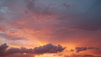 Sunset with orange clouds and a sky.