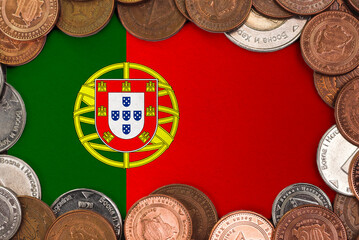Coins on flag of Portugal trading investment business currency concept

