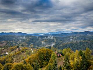 Fototapeta premium Misty Autumn Rain Clouds over Ukrainian Carpathian Mountains.