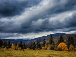 Misty Autumn Rain Clouds over Ukrainian Carpathian Mountains.