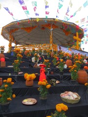 traditional mexican kiosk in a town plaza decorated with marigold-cempasuchil and the altar-ofrenda for the day of the dead- dia de los muertos, Mexico