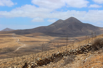 Arid Mountain Landscape in Fuerteventura with Sparse Desert Vegetation