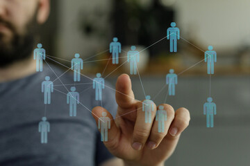Connecting people and ideas through a digital network. Concept of teamwork, social media, collaboration, and technology. Human touch point of a