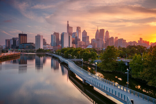 Philadelphia, Pennsylvania, USA. Cityscape image of downtown Philadelphia, Pennsylvania and Schuylkill River leading to the city at beautiful autumn sunrise.