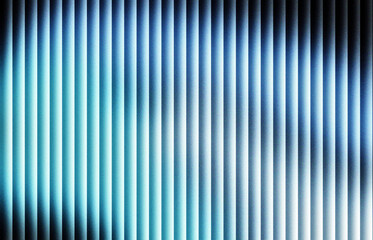 Obraz premium Abstract background of blue and white vertical blinds creating a textured pattern with light and shadow for modern design and architectural applications
