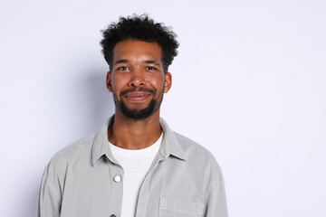 Portrait of handsome man on white background, space for text
