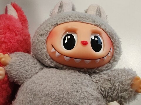 Rome, Italy - October 27, 2025, detail of a Labubu line of puppets distributed by the Chinese store chain Pop Mart, a character created by illustrator Kasing Lung for the book series The Monsters.
