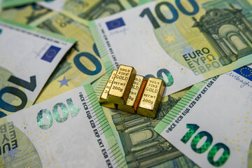 Gold bars and euro money, business capital, banking, financial success and investment strategy