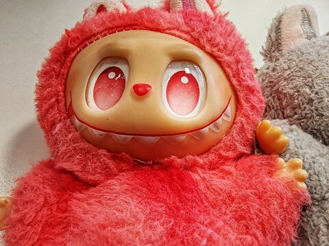 Rome, Italy - October 27, 2025, detail of a Labubu line of puppets distributed by the Chinese store chain Pop Mart, a character created by illustrator Kasing Lung for the book series The Monsters.