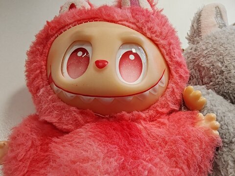 Rome, Italy - October 27, 2025, detail of a Labubu line of puppets distributed by the Chinese store chain Pop Mart, a character created by illustrator Kasing Lung for the book series The Monsters.