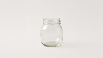Glass, empty jar on a white background, close-up