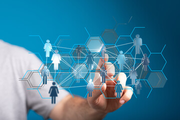 Hand interacting with a digital network, representing concepts like connection, technology, and global communication.