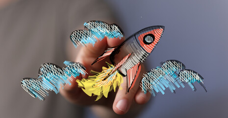 Creative illustration of a hand holding a drawn rocket, representing innovation, success, and the...