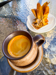 Enjoy fresh coffee and pastry under the sunlight