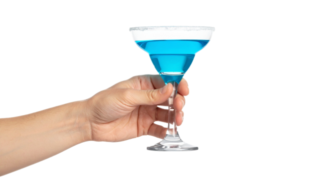 A hand holding a vibrant blue cocktail in an elegant glass. The rim of the glass is decorated