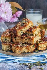 Healthy home baked rolled oats, pumpkin and sunflower seeds breakfast cakes