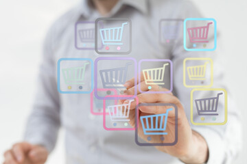 Person interacting with shopping cart icons on a screen, symbolizing online shopping, e-commerce, and digital transactions. Concept of buying, s