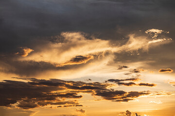 Orange clouds in the sky at sunset