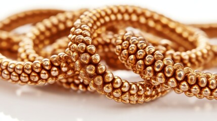 Close Up of Golden Beaded Necklace Showing Texture and Detail