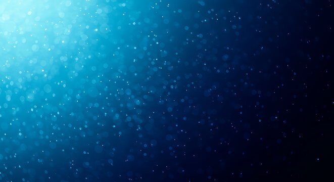 Abstract background of tiny blue particles floating in a dark, deep blue illuminated space