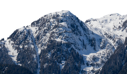 Mountain winter landscape in Canada. Mountain covered by ice, snow and trees isolated on transparent background. Winter mountain scenery at close distance. Mountain range at high elevation. PNG.