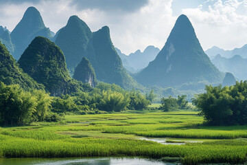 A dramatic karst landscape with jagged limestone peaks piercing the sky