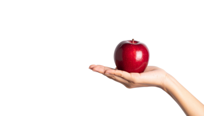 A vibrant red apple rests in the palm of a hand, highlighting nature's simple beauty and a healthy lifestyle. This image symbolizes health, freshness, and the perfect fruit