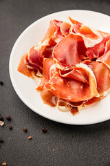 jamon serrano meat appetizer jamon iberico natural product tasty snack fresh delicious gourmet food background on the table rustic top view copy space