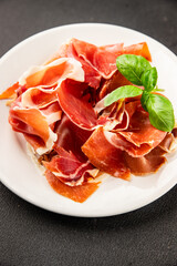 jamon serrano meat appetizer jamon iberico natural product tasty snack fresh delicious gourmet food background on the table rustic top view copy space