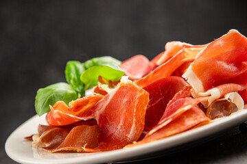 jamon serrano meat appetizer jamon iberico natural product tasty snack fresh delicious gourmet food background on the table rustic top view copy space