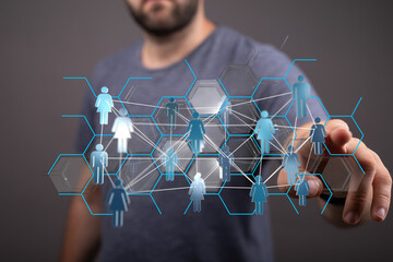 Person interacting with a digital network concept. Illustrating communication, teamwork, and global connections. Highlighting data exchange and
