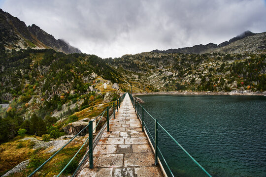 Dam of the reservoir at the Refugi dera Restanca, La Val d'Aran, Catalonia, Pyrenees mountains, Spain, Europe