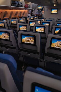 Airplane Cabin Interior with Passenger Seats and Screens &ndash; Modern Air Travel