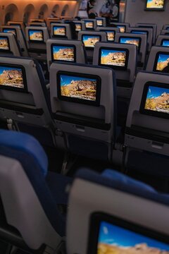 Airplane Cabin Interior with Passenger Seats and Screens &ndash; Modern Air Travel