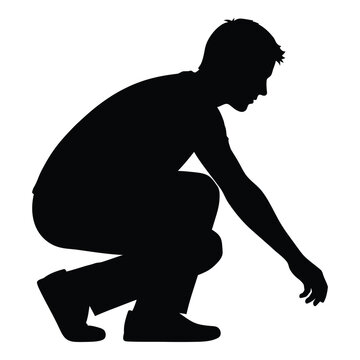 Silhouette of a person crouching down and reaching out with one hand silhouette