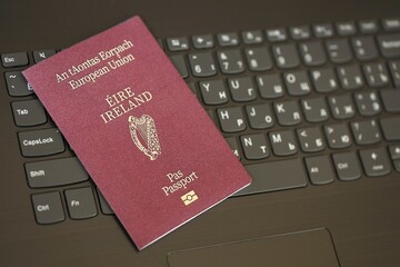 Ireland Passport Lies Black Laptop
