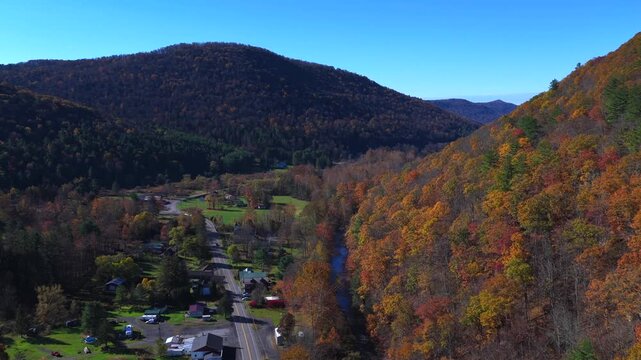 Peaceful small mountain town, Morris, PA in Autumn Fall Colors with houses and homes in rural community in Pennsylvania