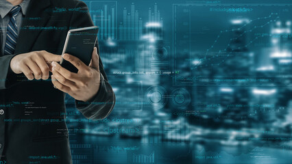 A businessman interacts with a smartphone while surrounded by data visualizations. The modern cityscape at night provides a dynamic backdrop for technology and finance themes. Xenic