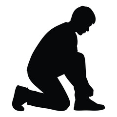 Naklejka premium Silhouette of a person tying shoes kneeling down for athletic activity and daily tasks silhouette
