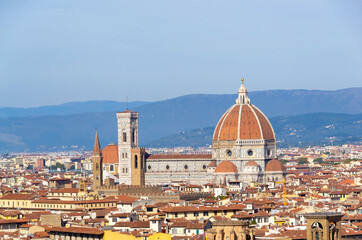 Obraz premium Historic Florence Cityscape Over the Arno River With Bridges and Palazzo Vecchio Tower
