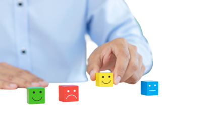 Hands holding toy block puzzle piece concepts symbolizing business solution and teamwork success