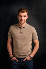 Studio shot of a handsome young man standing against isolated background with copy space