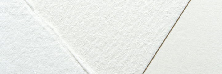 Abstract minimalist texture on white paper surfaces with subtle geometric overlays and patterns.