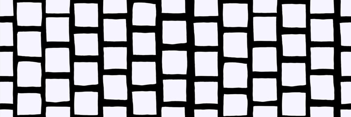 The pattern a drawn rectangle with irregular lines. A hand checks the vector square placed on paper. The shape has a rough edge.