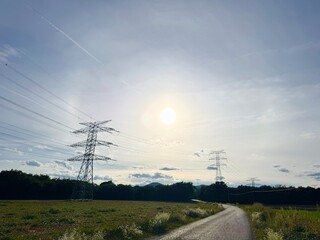 Electric Power Transmission Towers and High Voltage Lines over Agricultural Landscape – Energy Supply Network