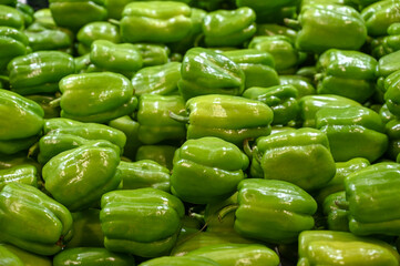 Fresh green pepper for sale at the market. Peppers in the store.
